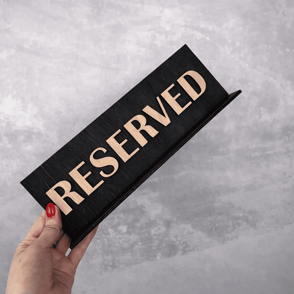 Custom bold lettering reserved sign